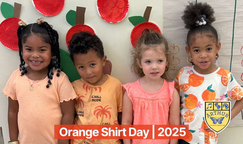 4 Young  Students Wearing Orange Shirts