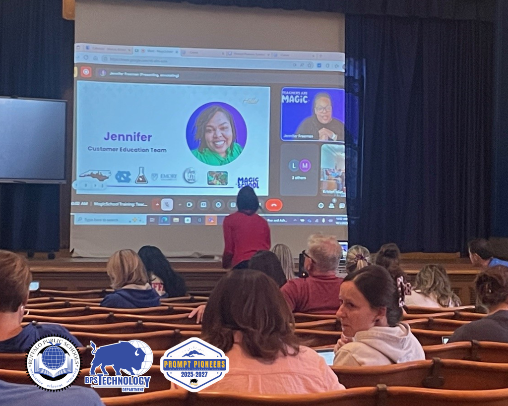 Teachers sitting in an auditorium getting virtual training from Magic School