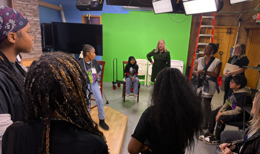 Studnets From School at News Studio WIVB with Anchor talking to them