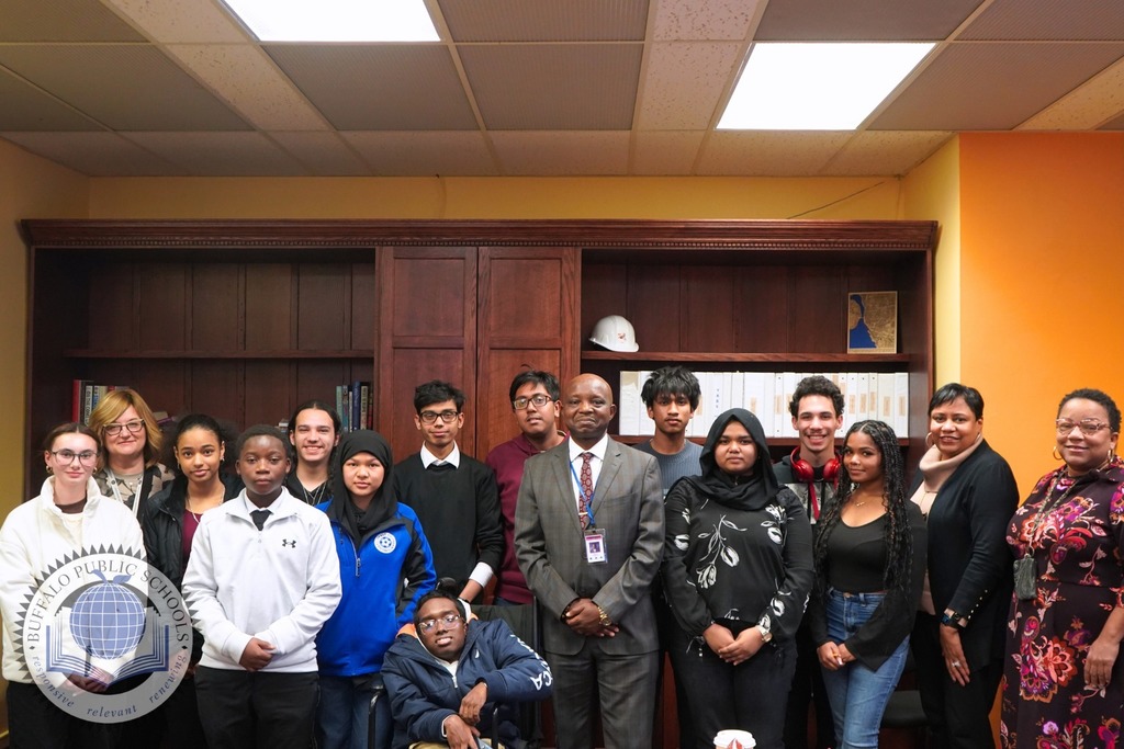 Members of the High School Student Council standing in a group photo with Dr. Mubenga and Dr. Sharon Brown