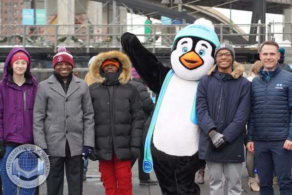 Group Photo with Penguin Mascot