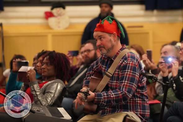 Teacher Playing the Guitar