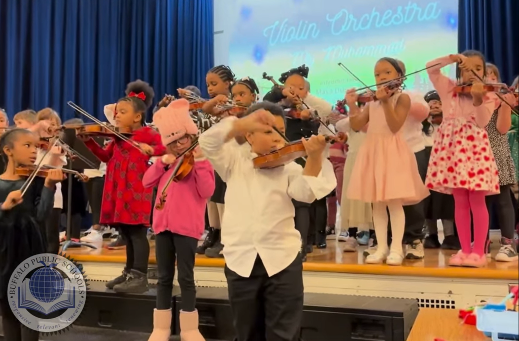 Student Violinist On Stage from School 61  Performing