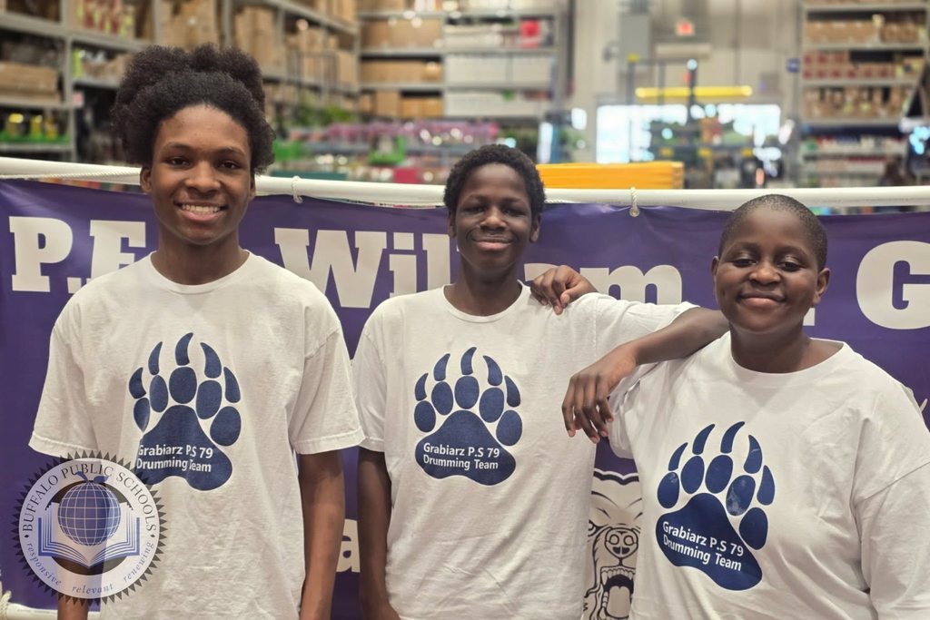 3 Students with School 79 Tee Shirts on.