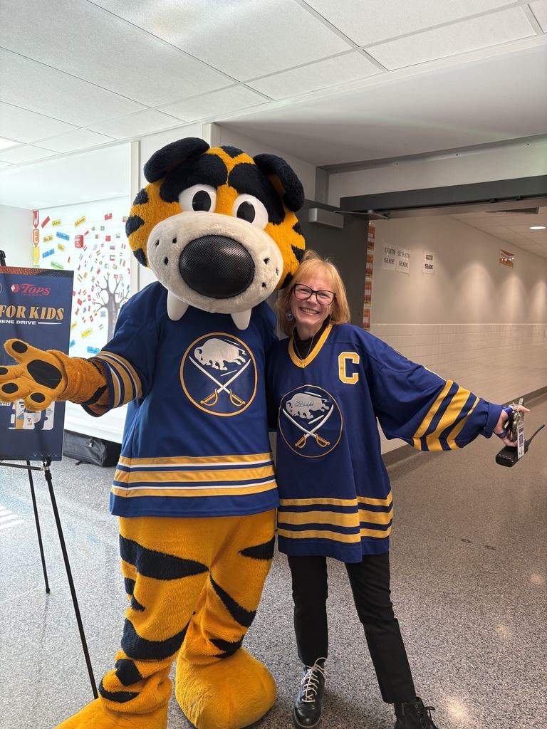 Teacher with Sabretooth Sabres Mascot
