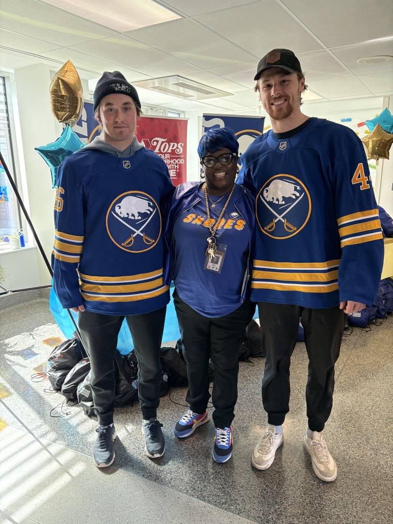 Teacher with Two Buffalo Sabre Hockety Players