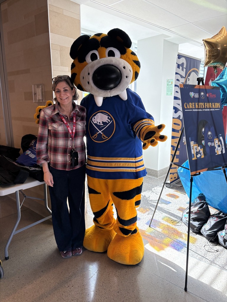 Teacher with Sabretooth Sabres Mascot