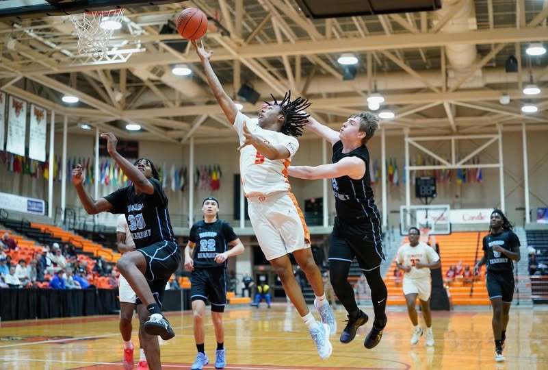 Basketball Player going up for a layup.