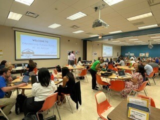 Prompt Pioneers Day Room with Peple Interacting