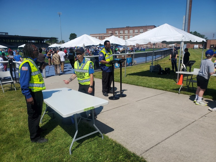 BPS Summit - security guard setting up tables