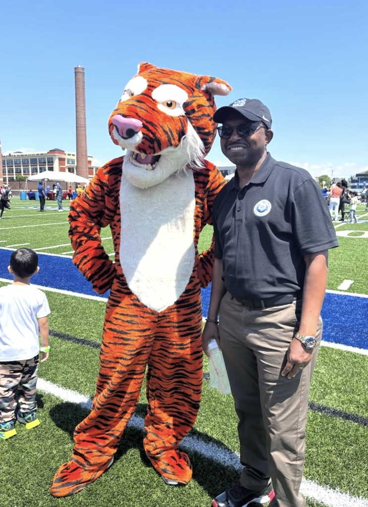 superintendent with tiger mascot