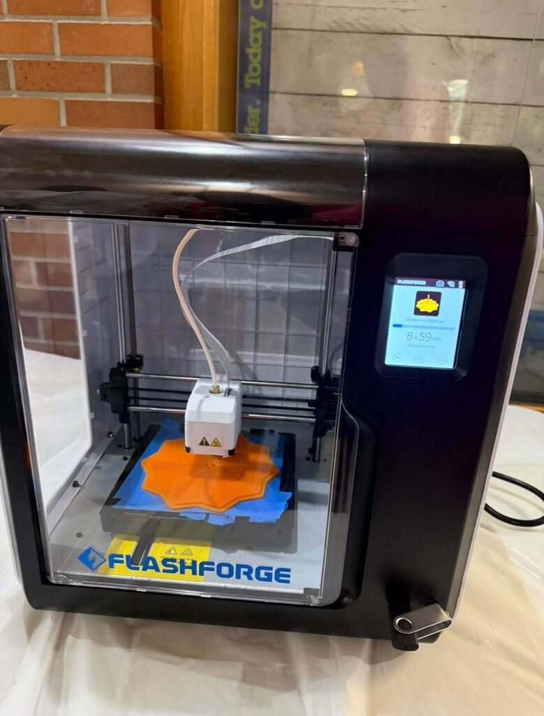 3D Printer printing an object