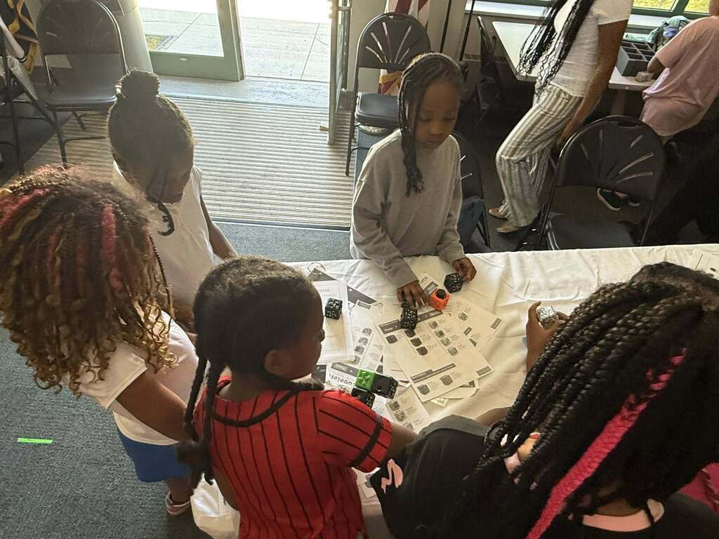 Students playing with Cubelet Robots
