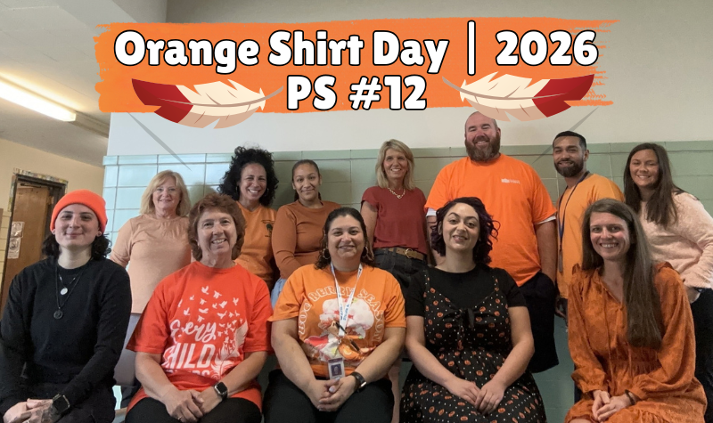 Staff from School 12/Central Registration waering orange shirts