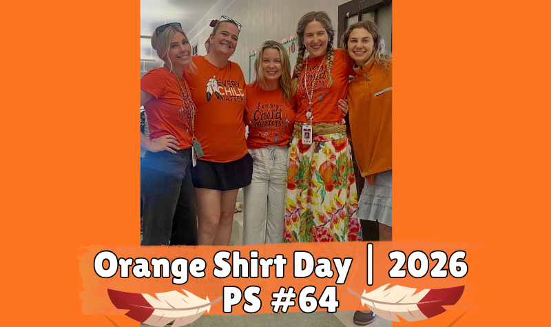 Teachers from School 64 wearing orange shirts