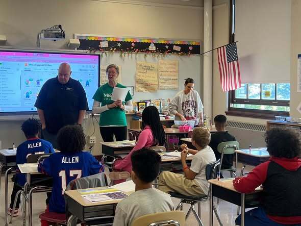 Volunteer leading Classroom