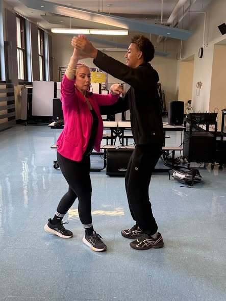 Students and Adults Salsa Dancing