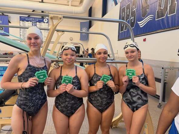 BPS Girls Swimmers holding Varsity Sectional Award
