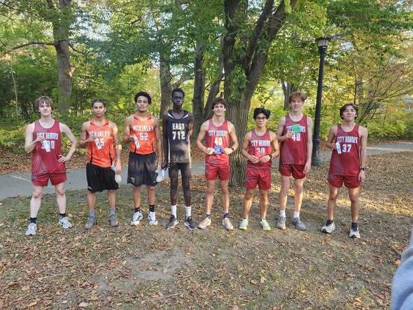 Boy Runners Holding Patch