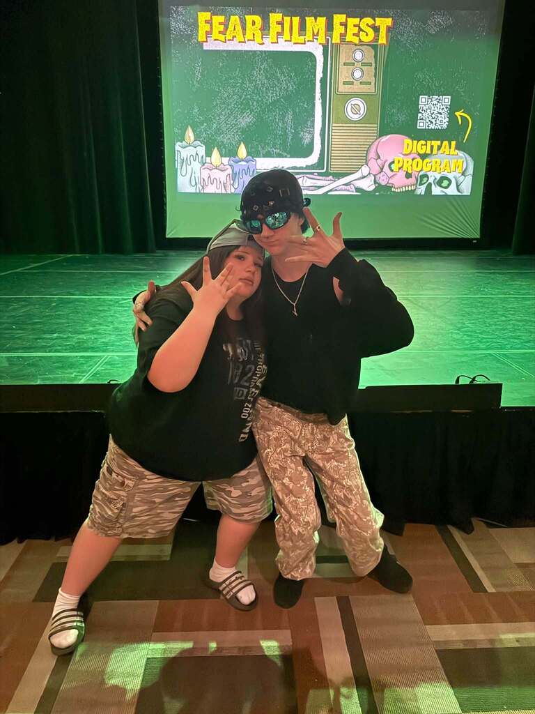 two stunts posing
