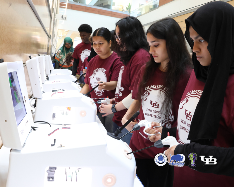 Girls flying virtual Drones on computer