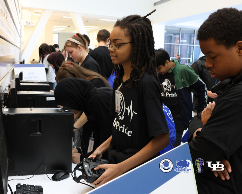 Girls flying virtual Drones on computer