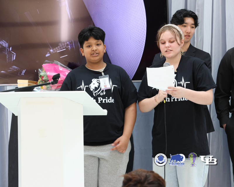 student talking at podium