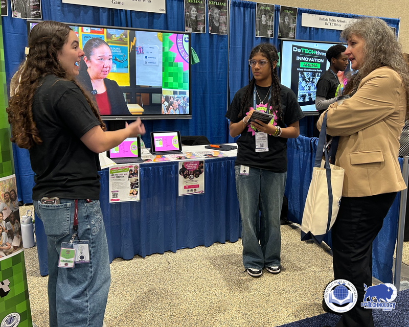 BPS Students at Conference at their booth talking to people