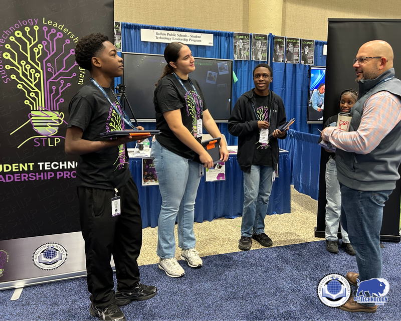 BPS Students at Conference at their booth talking to people