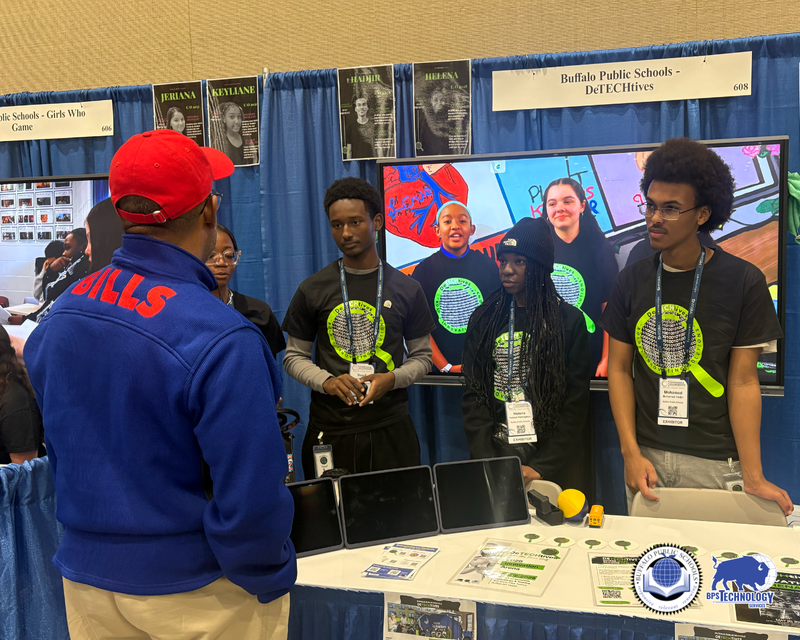 BPS Students at Conference at their booth talking to people