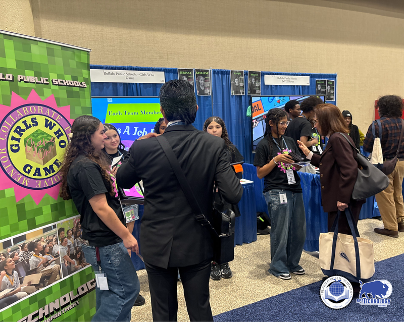 BPS Students at Conference at their booth talking to people