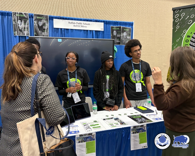 BPS Students at Conference at their booth talking to people