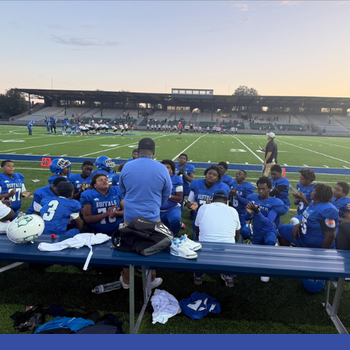 Coach Talking to Players
