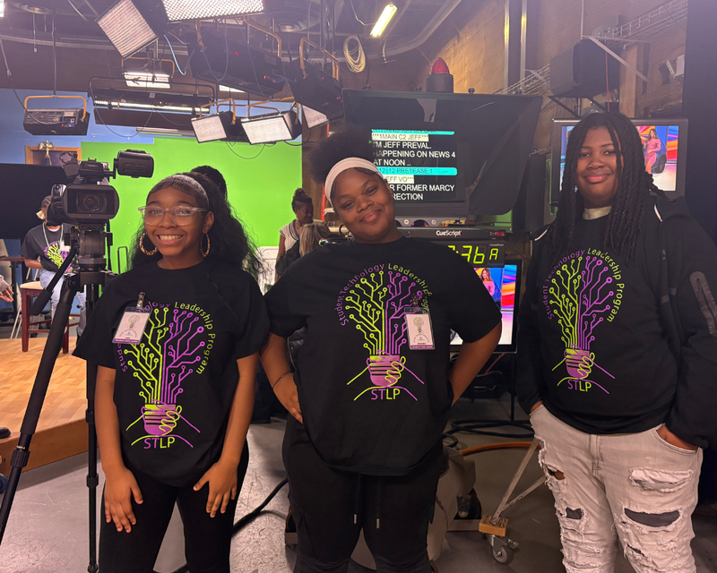 3 Students  smiling on WIBV  Studio  with a green screen in the background 