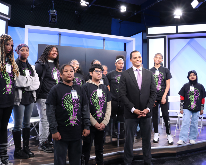 Group photo with WIVB Anchor man on the set.