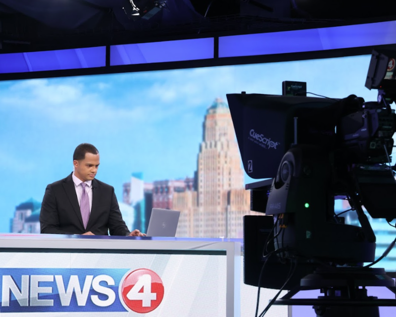 News Anchor giving broadcast