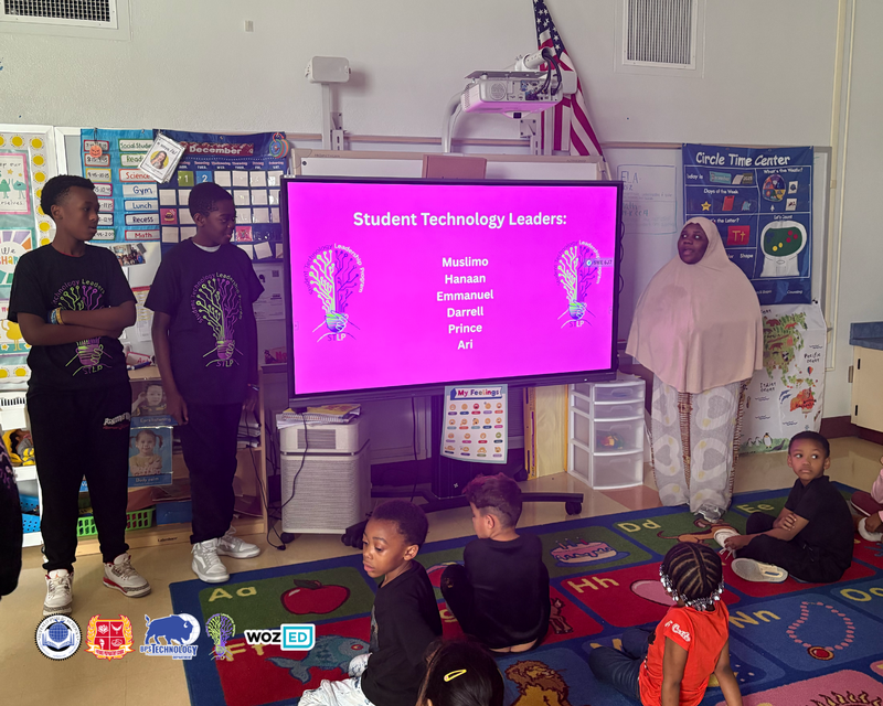 STLs Introducing a Lesson at the board in front of young children