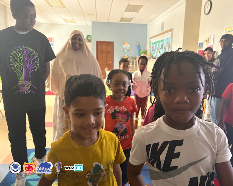 Students dancing on a rug