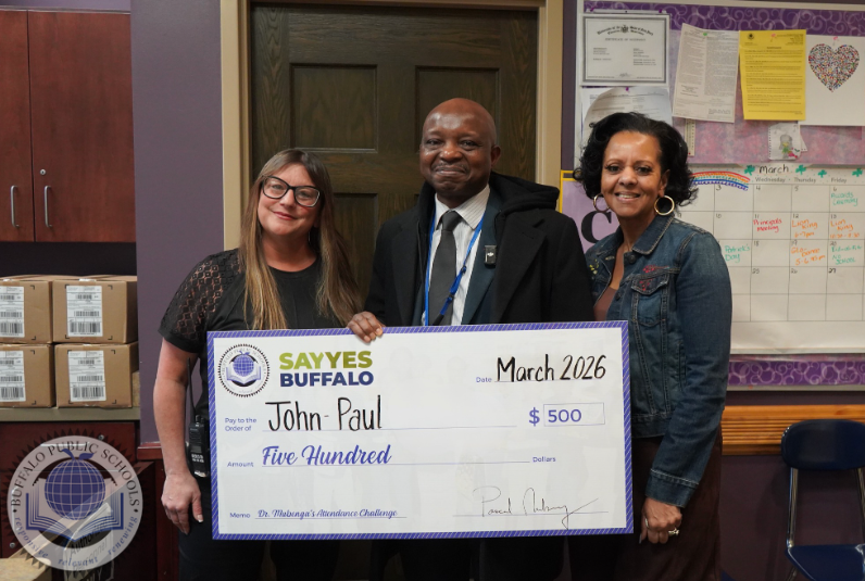 Superintendent Holding a large size check with two BPS Staff Members
