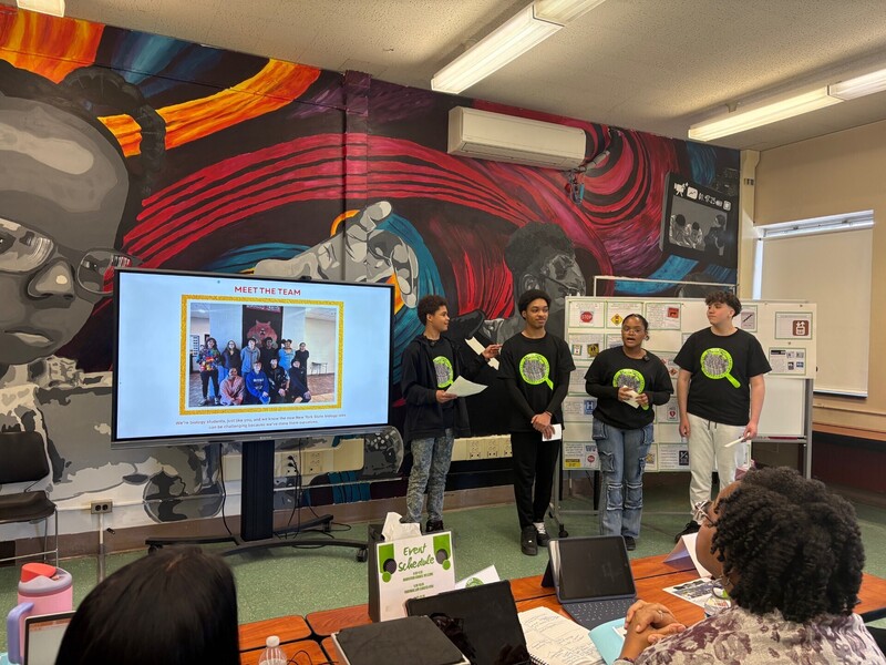 Students Presenting on a display monitor 