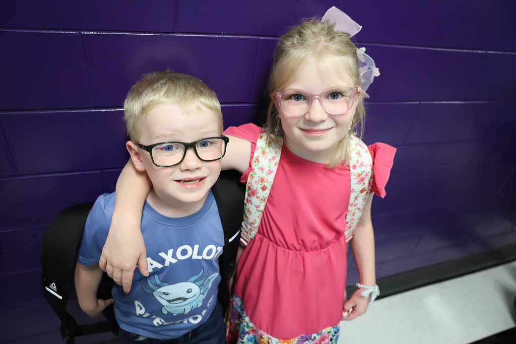 Two students standing together