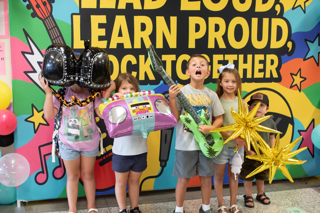 Excited Students with Rock and roll props