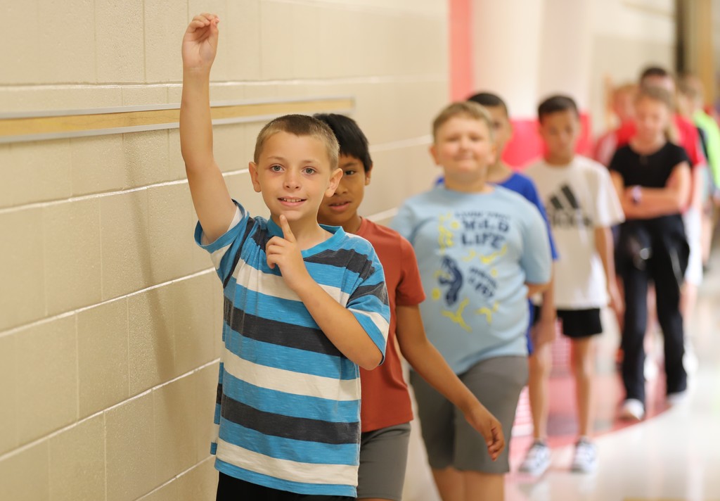 Students walking in class