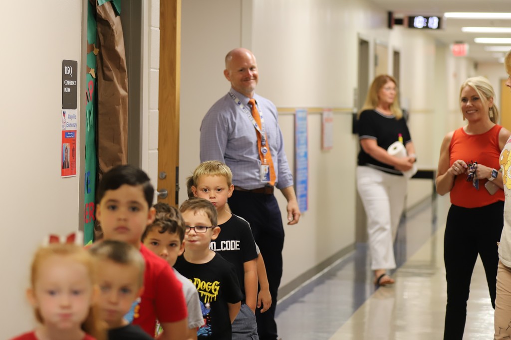 Students in hallway with Dr. Bacon and Mrs. Wyman