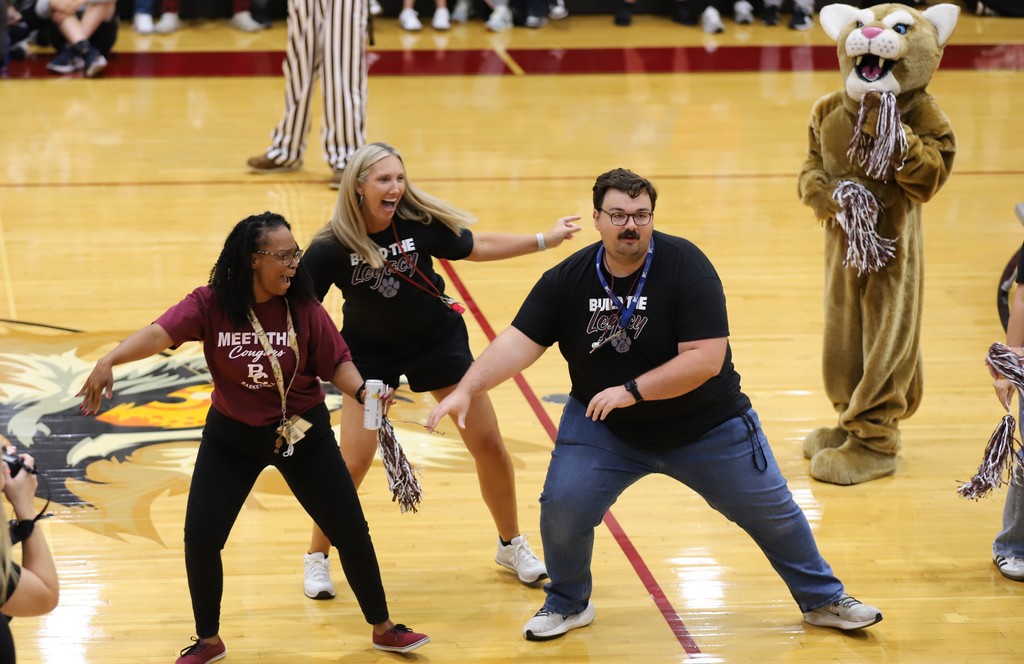 Teachers swag surfing at pep rally