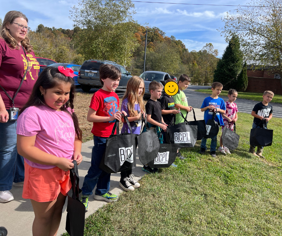 Mrs. Kimball's class getting ready for pumpkins.
