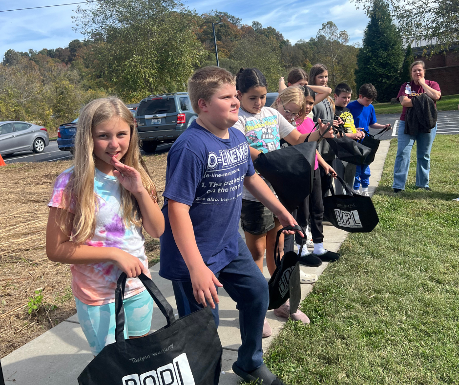 Fifth grade waiting to pick pumpkins.