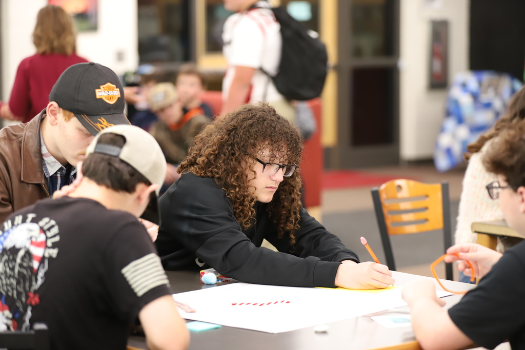 BEHS Student Working on Poster