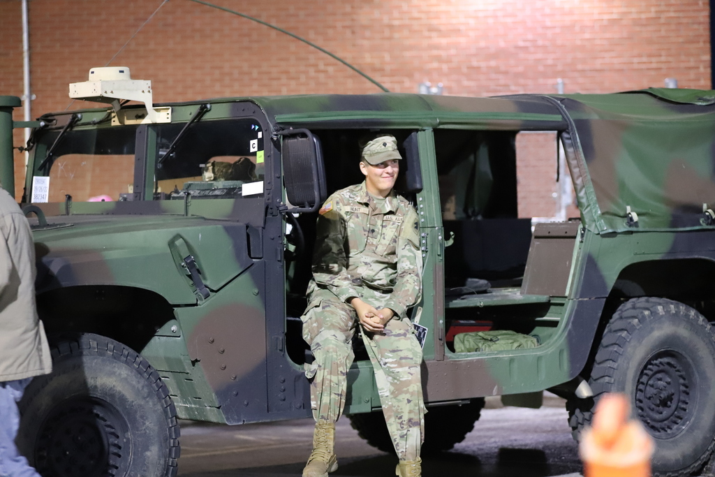 Army National Guard Member in Military Jeep