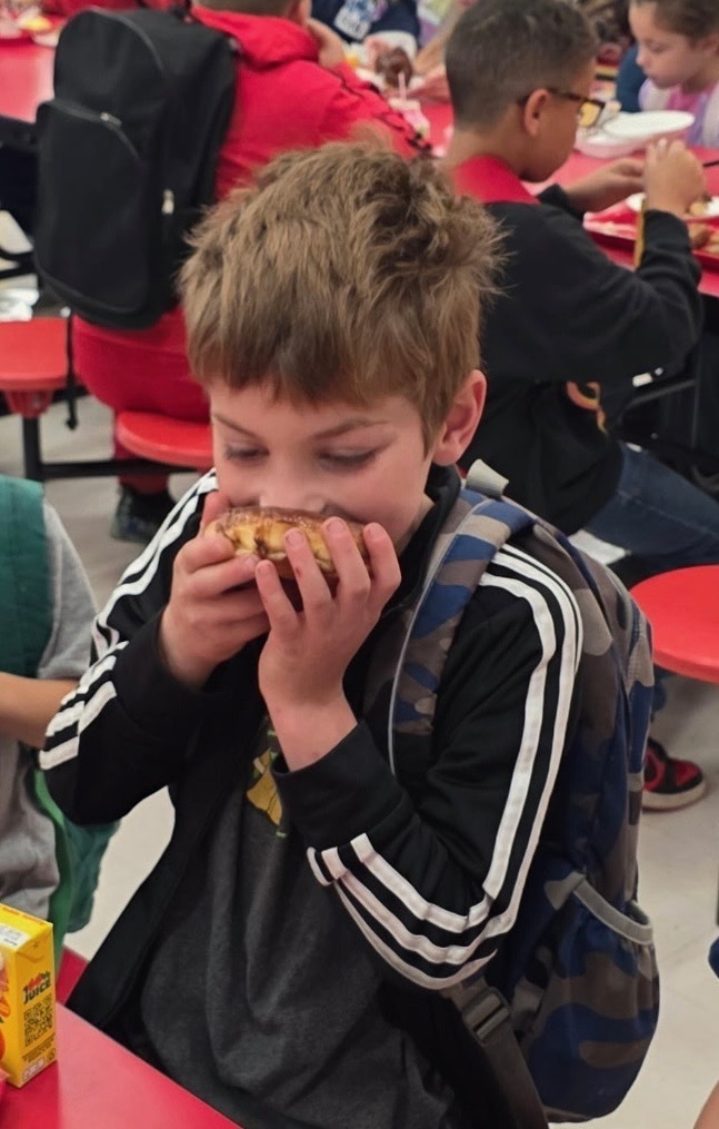 Kids with buddies and donuts